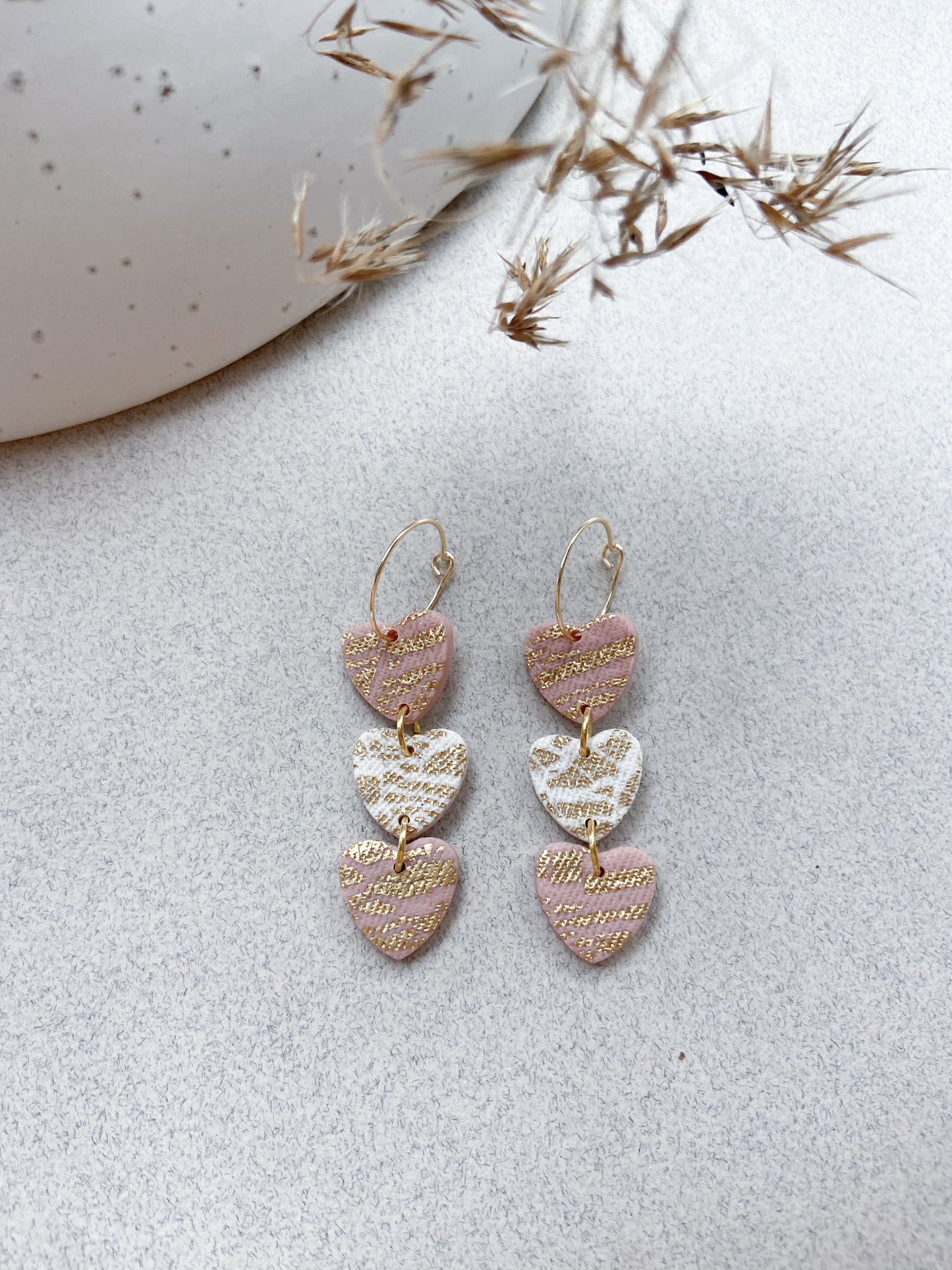 Triple heart dangle earrings